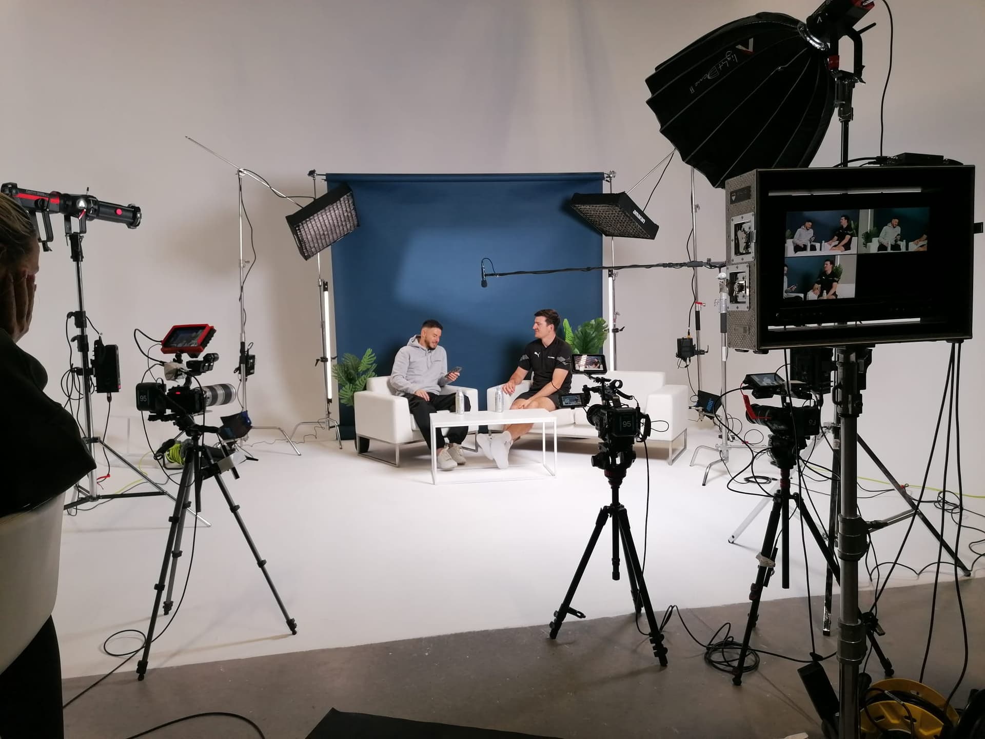 Professional studio interview setup with lighting and cameras - Newcastle video production studio