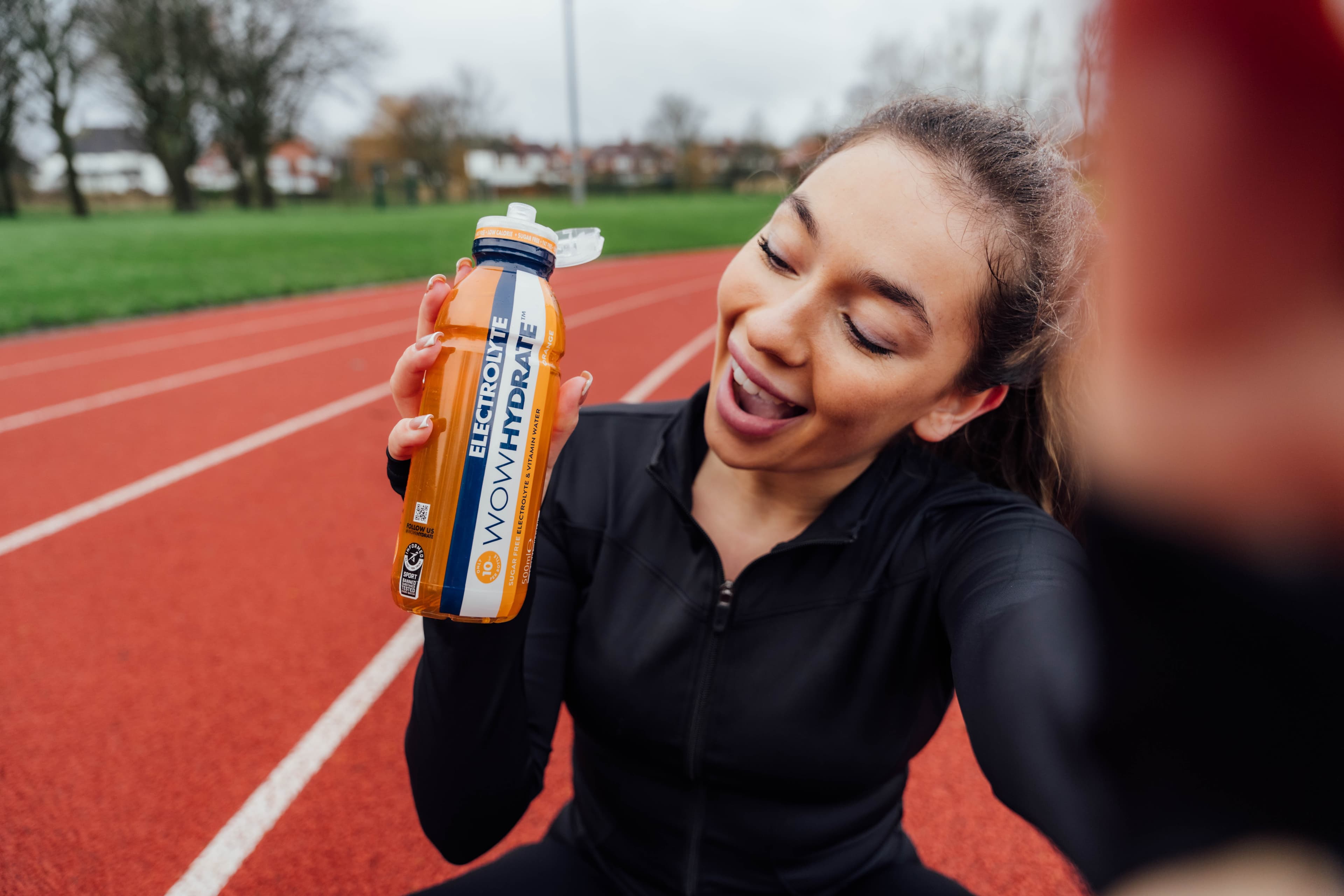 Wow Hydrate sports drinks video production campaign - athlete on running track Newcastle